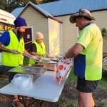 Sikh Volunteers Deliver Free Meals to Flood Victims